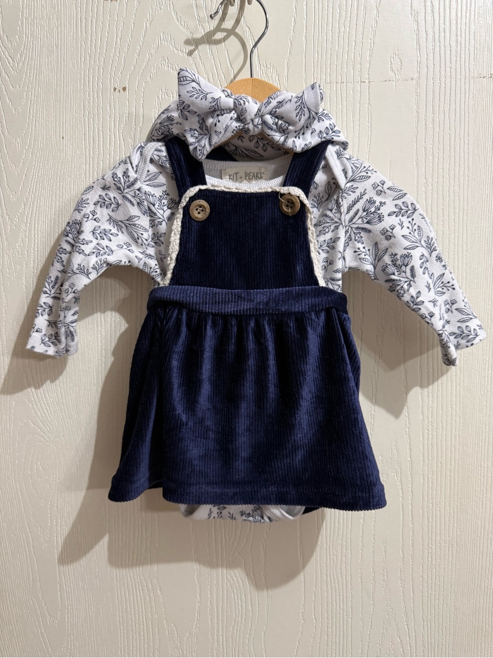 Kit and Pearl Navy Corduroy Pinafore Dress with White Floral Bodysuit and Bow